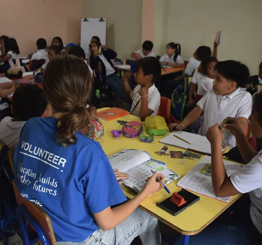 volunteer helping in class